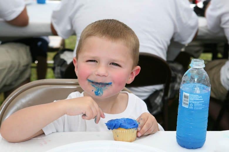 healthy eating habits for kids Building healthy eating habits for kids: A child with a blue frosting cupcake, Source: Jennifer O'Neal at AllExerciseBikes.net healthy eating habits for kids