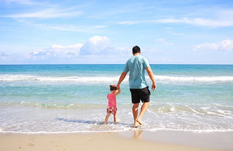 Father and daughter on the beach creating treasured memories, Source: Pexels
